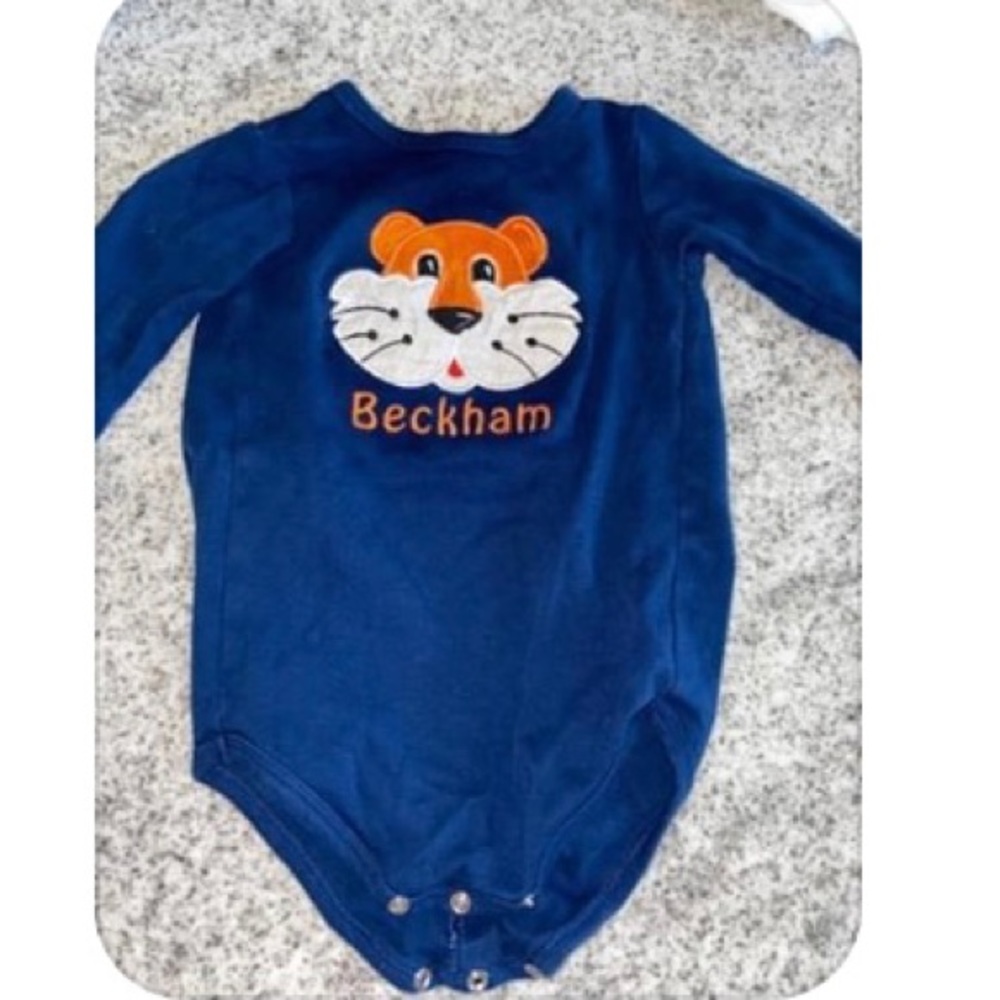 Blanks Boutique. “Beckham” long sleeve onesie